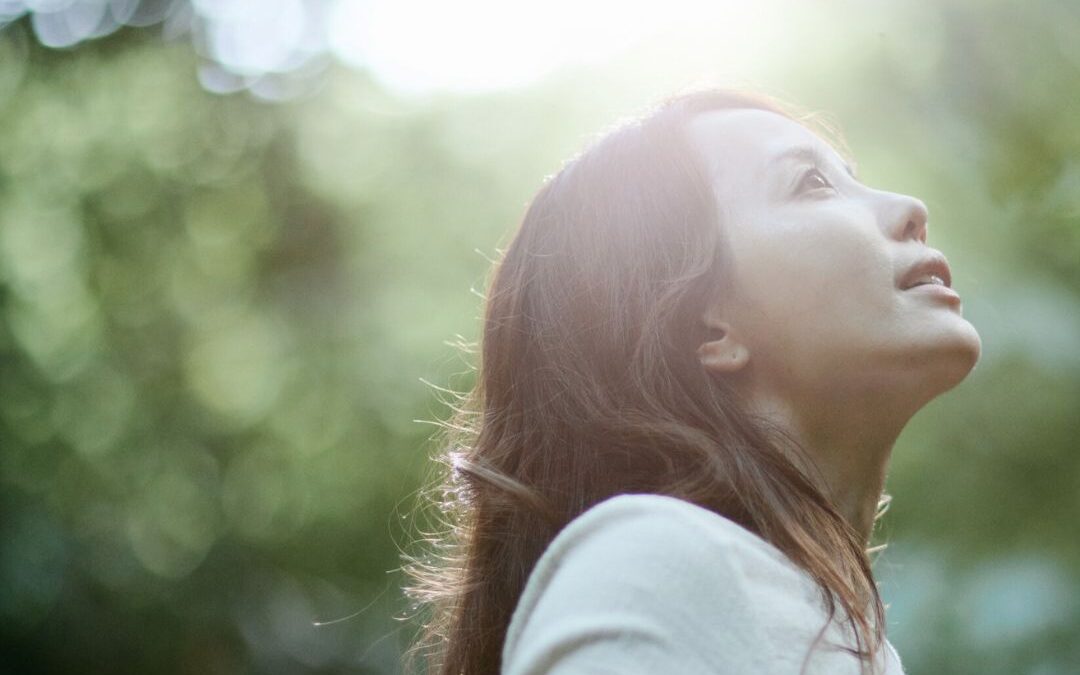 Woman standing in the light