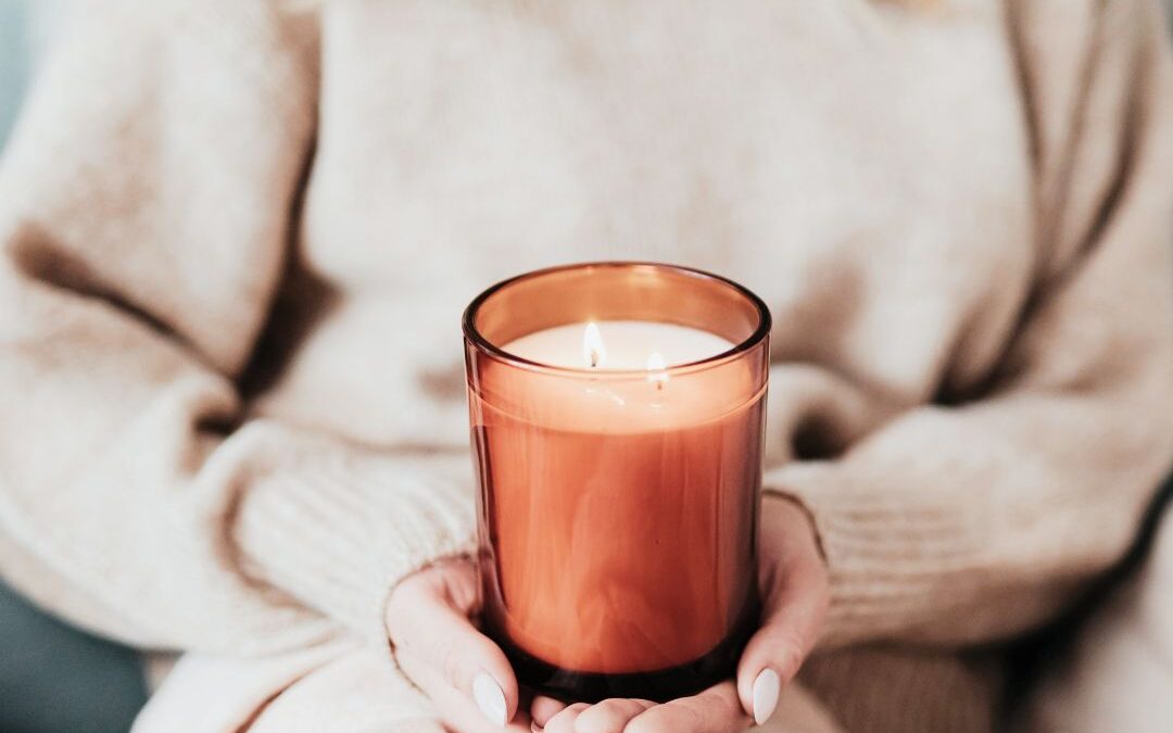 woman holding a candle