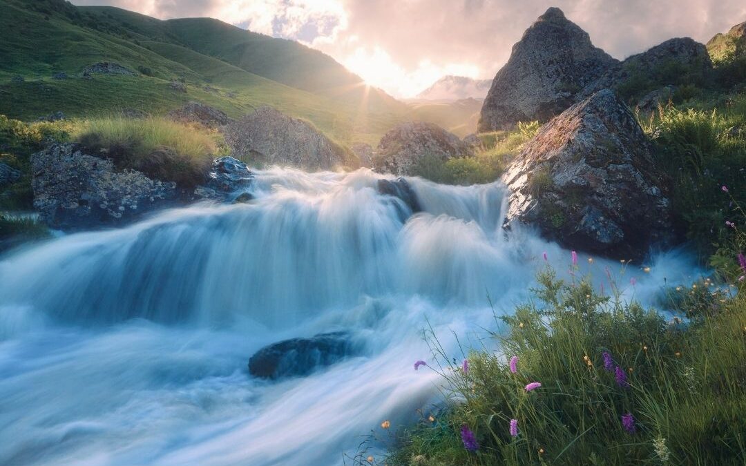 water flowing with sunrise