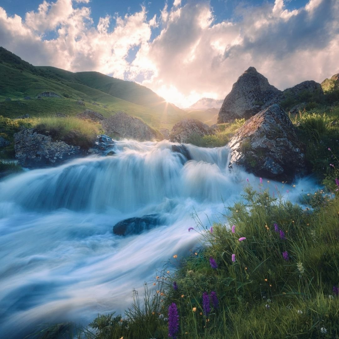 water flowing with sunrise