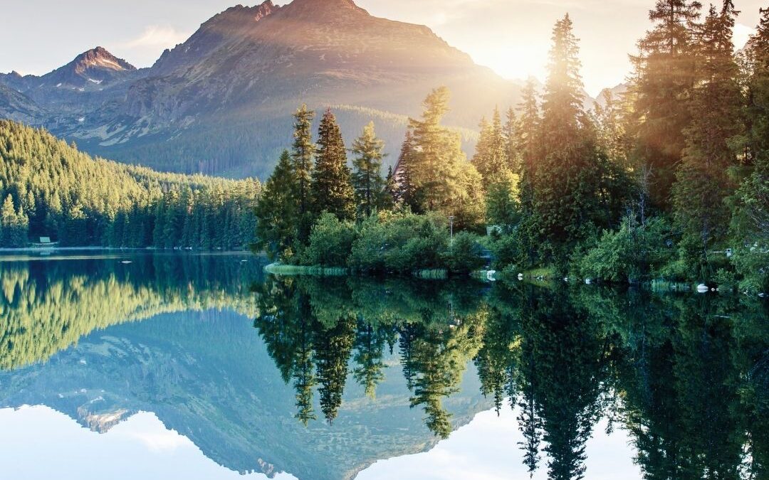 Lake mountain and sun