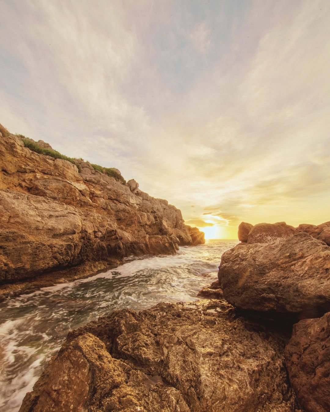 sun between rocks