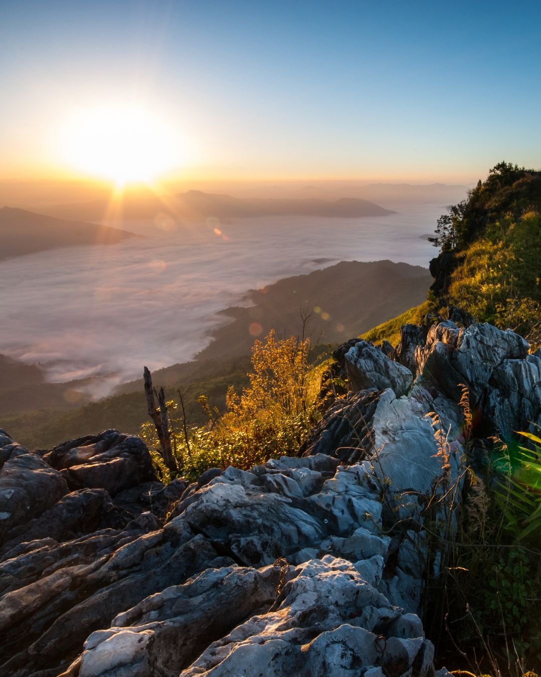 sun mountain top with rocks