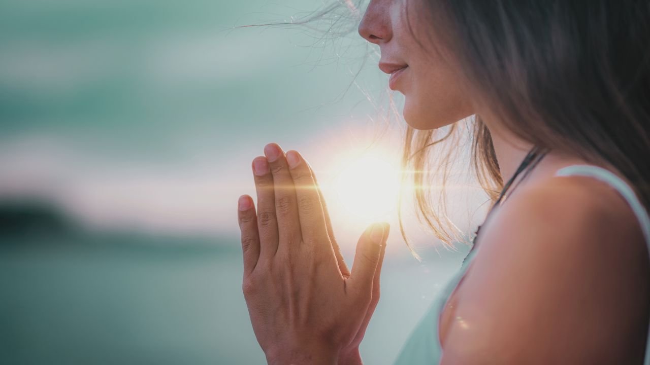 meditation library prayer hands with sun