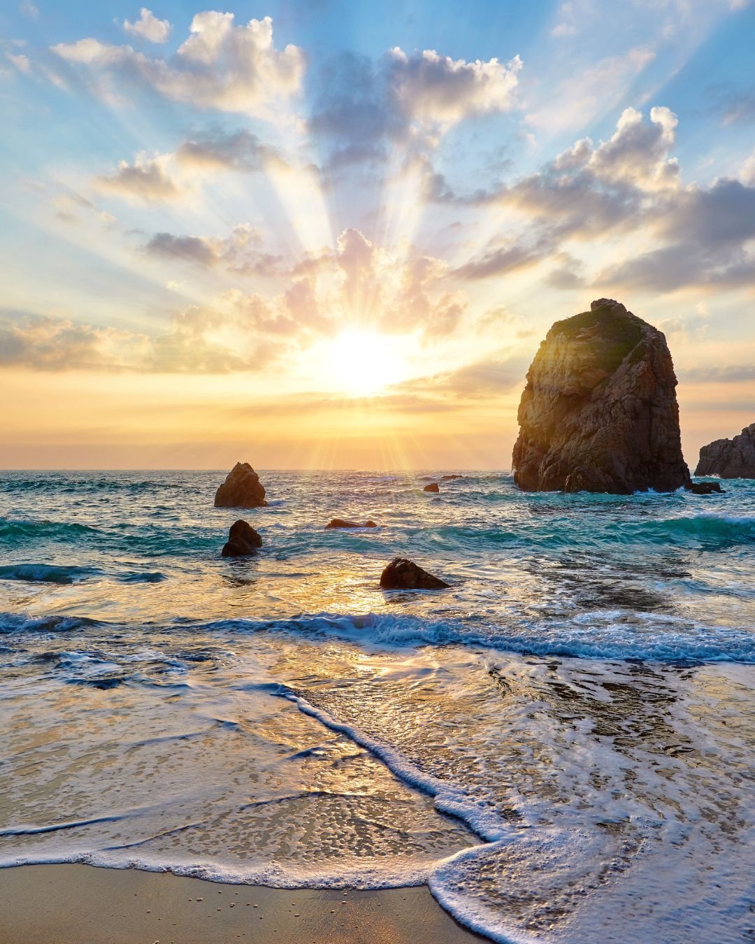 sunlight over ocean rocks