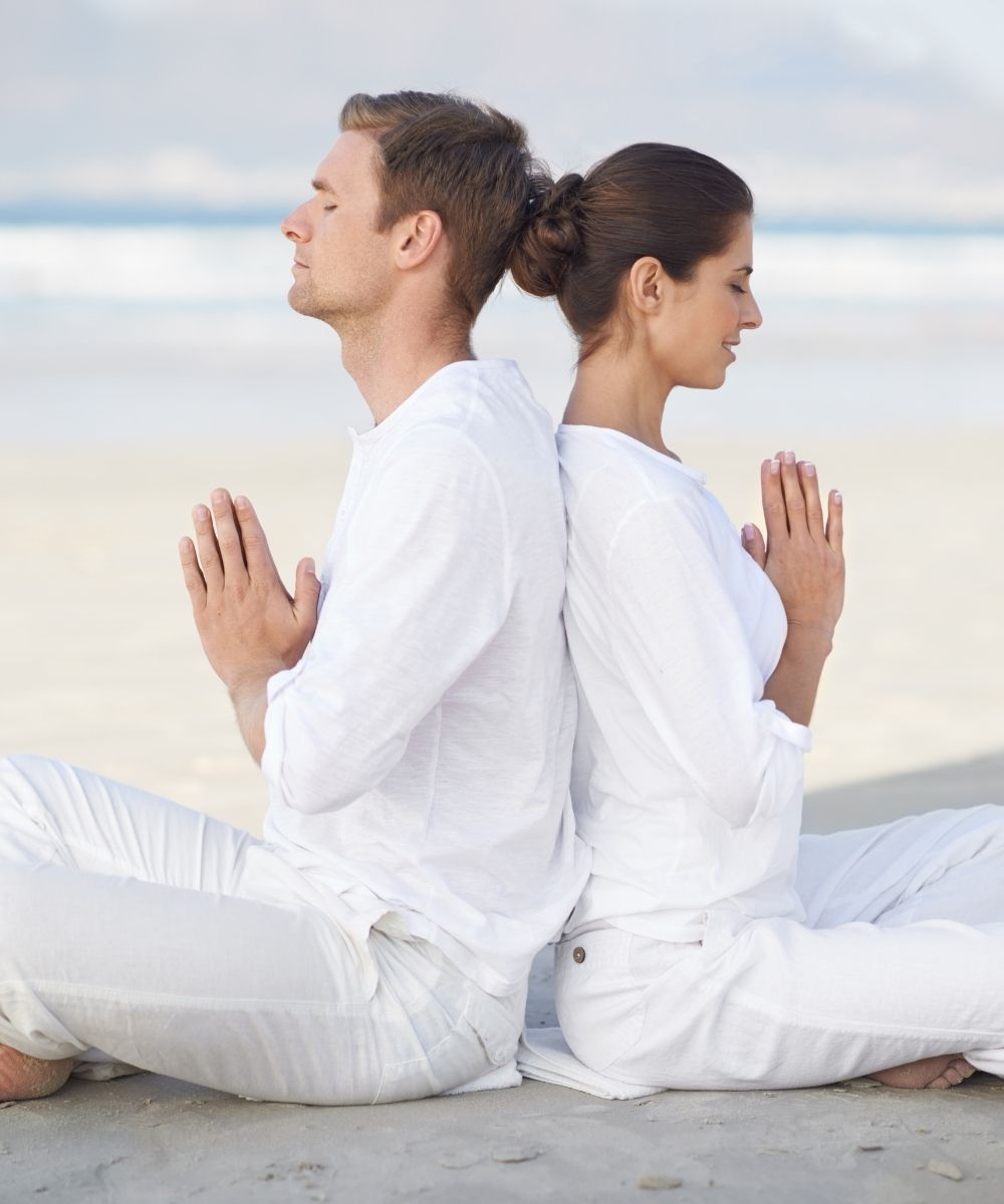 man and woman prayer hands