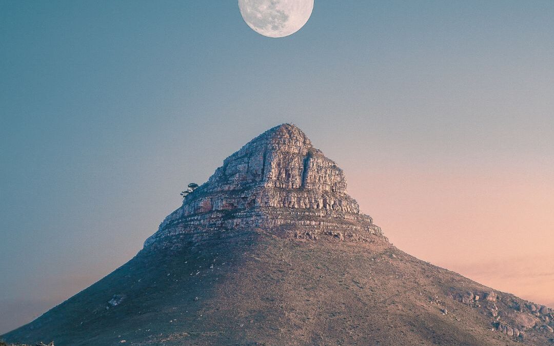 full moon mountain peak