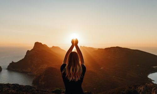 woman holding the sun