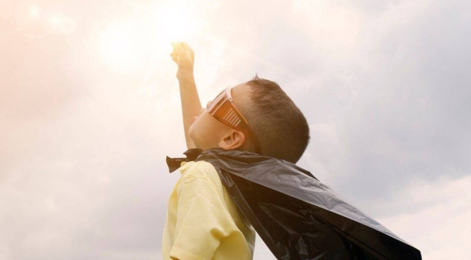 child with cape