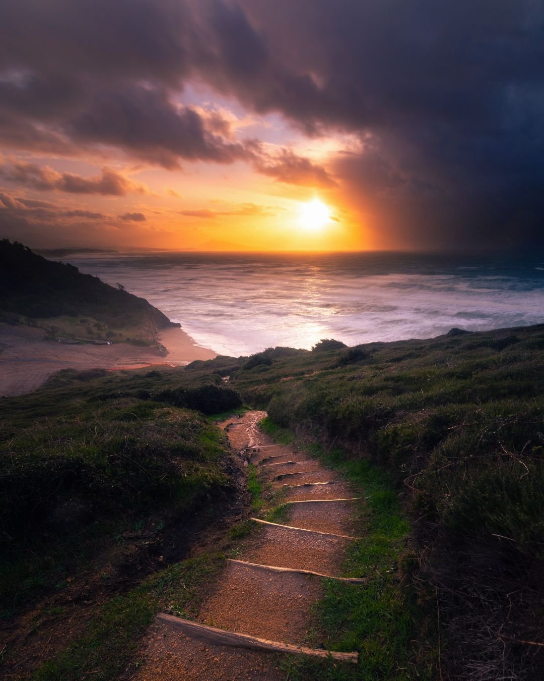 sun through storm clouds