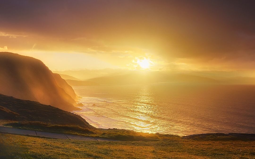 sun through storm clouds