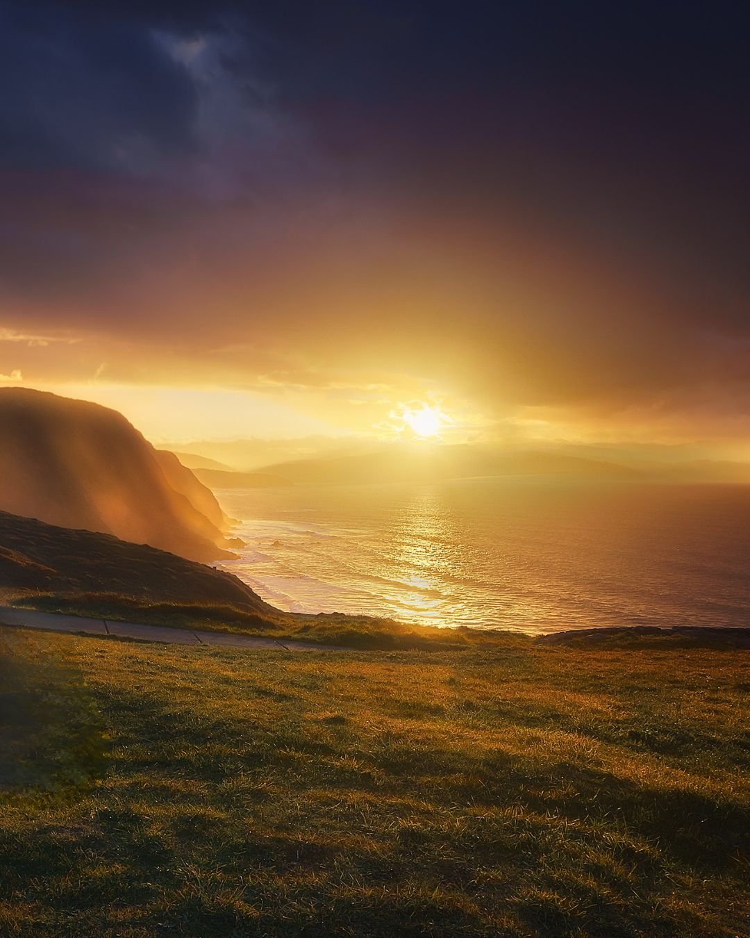 sun through storm clouds