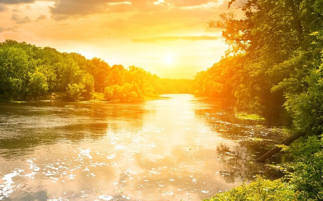 sun over river